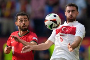 Kokcu insieme a Bernardo Silva